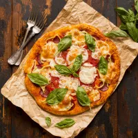 flat-lay-delicious-pizza-concept-wooden-table